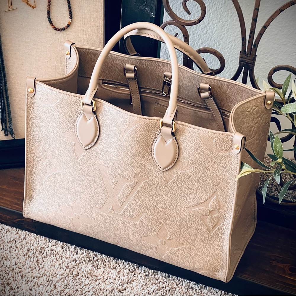 On the go MM purse Louis Vuitton